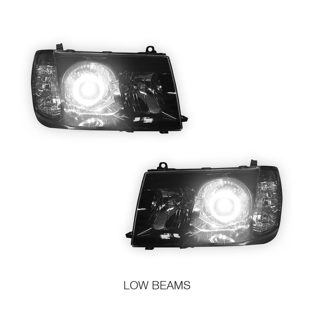 Toyota LandCruiser FJ100 Pre-Facelift (1998 - 2005) Black LED Angel Eye Halo Projector Headlights LH + RH