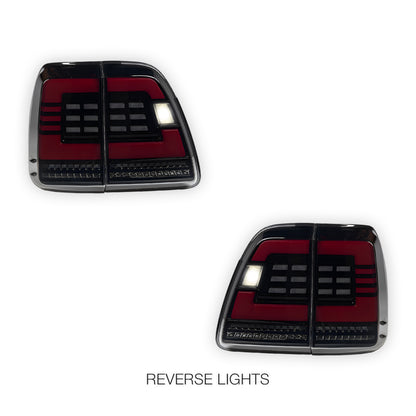 Toyota LandCruiser 100 Series (1998 - 2007) Black Sequential Full LED Tail Lights LH + RH